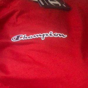 a red champion shirt